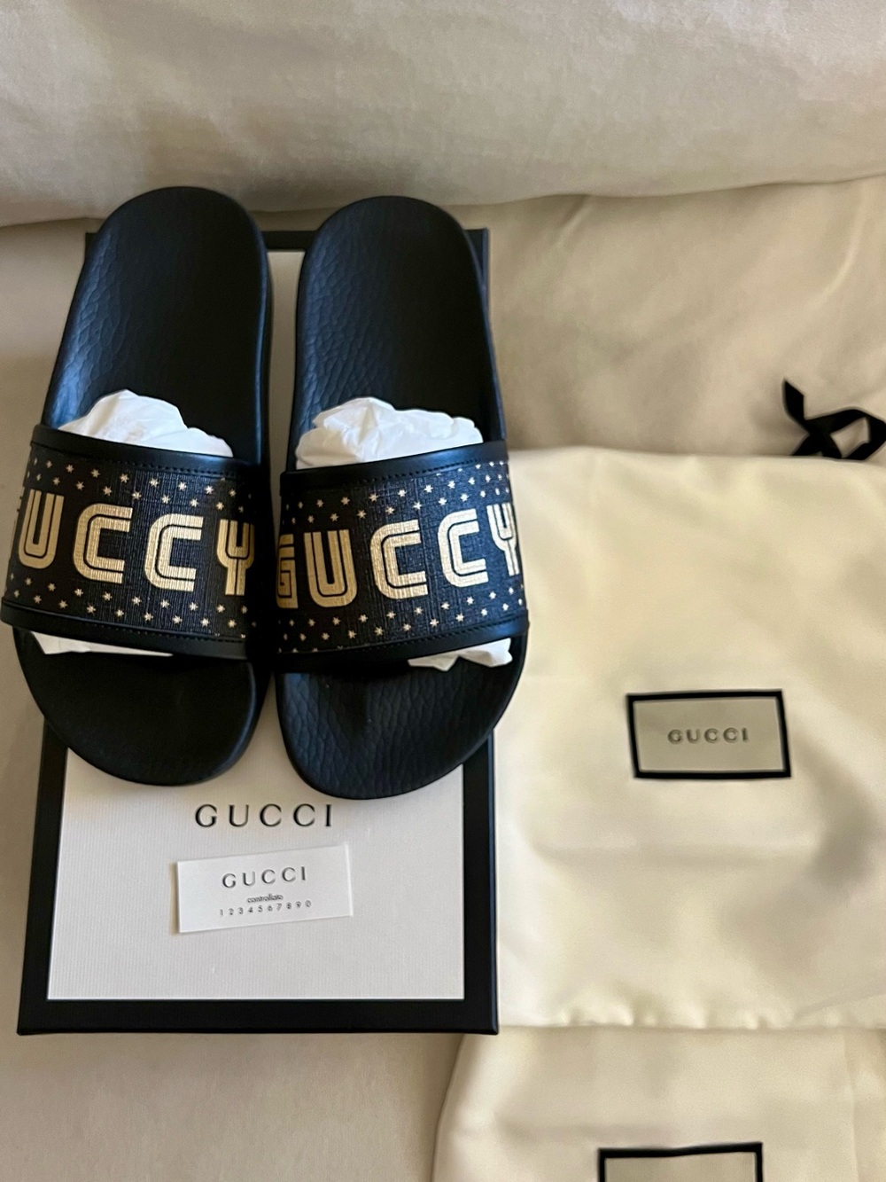 Gucci Authentic Black Slides with Gold GUCCY Logo